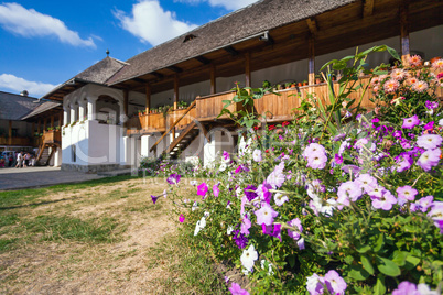 Flowers inside the old orthodox Polovragi monastery courtyard