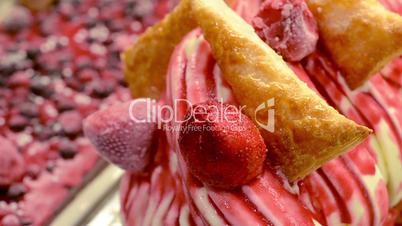 Italian gelato ice cream and strawberries crunch pie topping