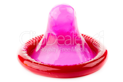 red condom on white background