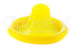 yellow condom on white background (Isolated)