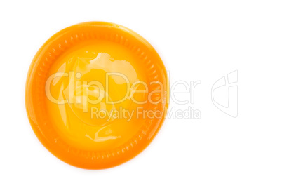 orange condom on white background (Isolated)