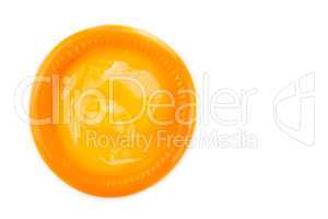 orange condom on white background (Isolated)