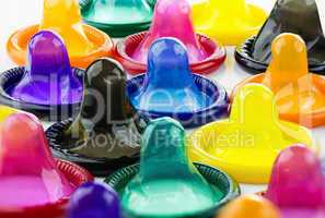 colorful condom on white background close-up