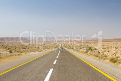 Beautiful road in the desert .
