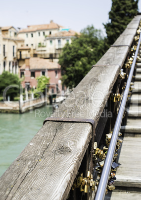 Padlocks of lovers placed on the bridge