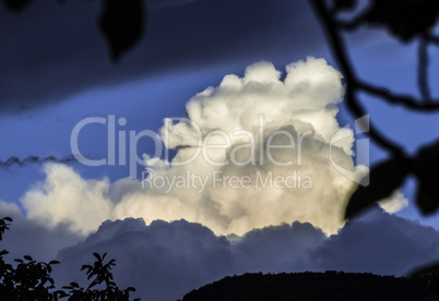 Dramatic clouds and deep blue sky