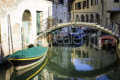 Ancient buildings in the channel in Venice.