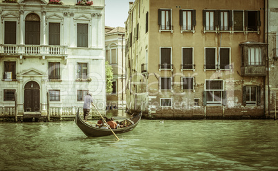 Ancient buildings in Venice. Boats moored in the channel. Gondol