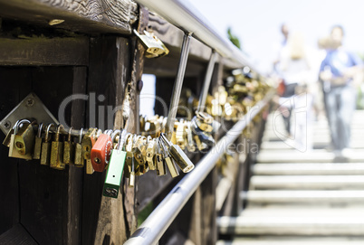 Padlocks of lovers placed on the bridge