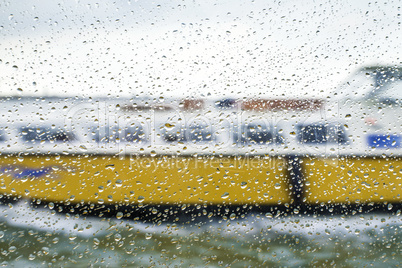Rain on glass ship