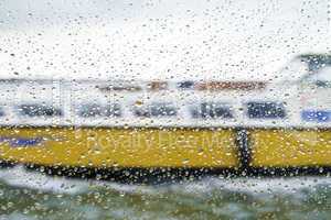 Rain on glass ship