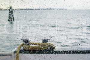 Rain on glass ship