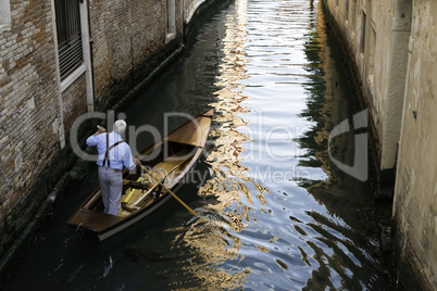 Man on a boat in Venice