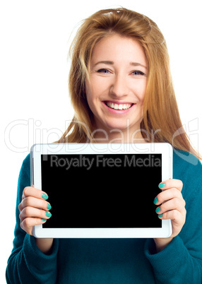 Young cheerful woman is showing blank tablet