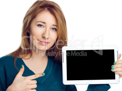 Beautiful woman holding a tablet computer and showing on black screen on white background.