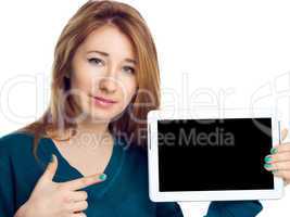 Beautiful woman holding a tablet computer and showing on black screen on white background.