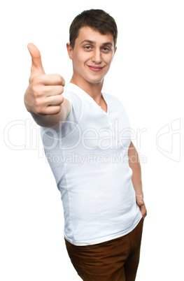 Happy smiling guy showing thumb up hand sign