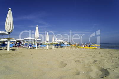 Yellow lifeboat on the beach.