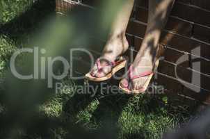 Foots on green grass