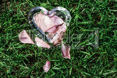Glass heart with rose petals
