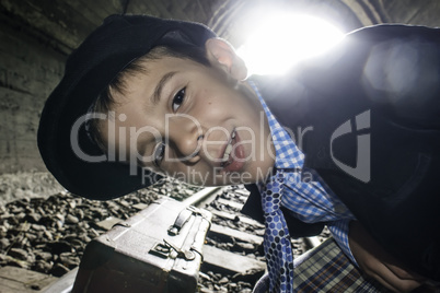 Child walking on railway road