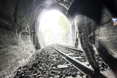 Child walking on railway road