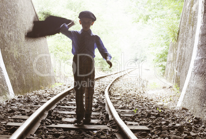 Child walking on railway road