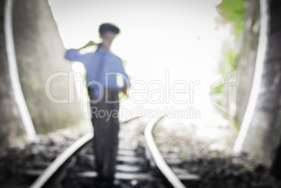 Child walking on railway road