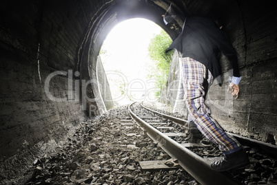 Child walking on railway road