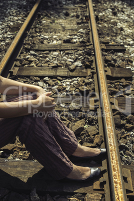 Woman on railway road