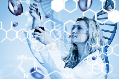 Composite image of female scientist examining blood