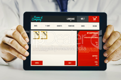 Composite image of businessman showing tablet pc