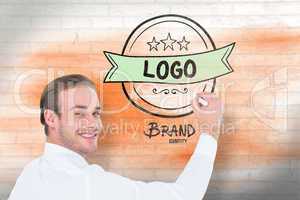 Composite image of cheerful businessman writing with marker