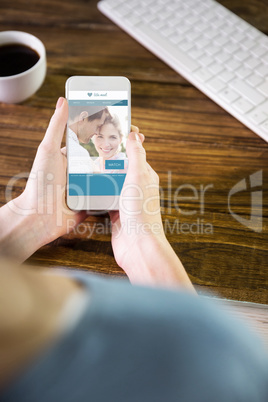 Composite image of woman using smartphone