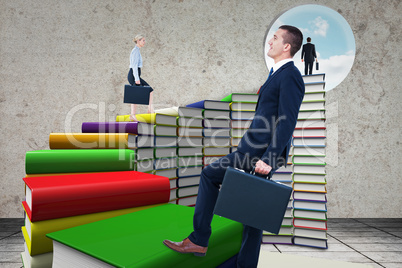 Composite image of businesswoman climbing with briefcase