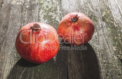 Pomegranate on wooden table