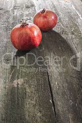 Pomegranate on wooden table