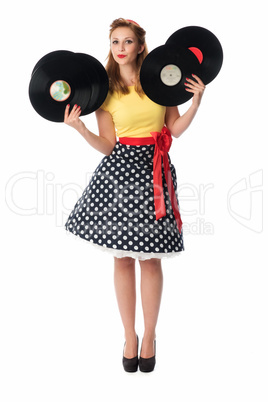Pin up Girl zeigt Schallplatten