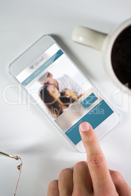 Composite image of businessman using smartphone