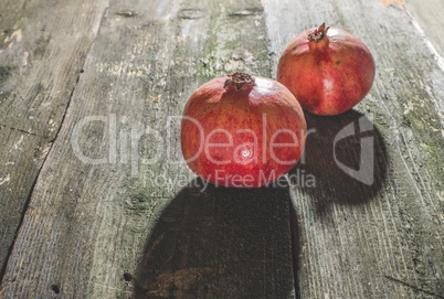 Pomegranate on wooden table