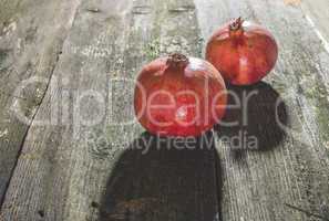 Pomegranate on wooden table