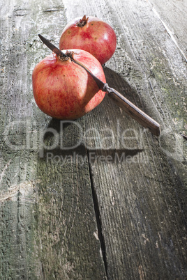 Pomegranate on wooden table