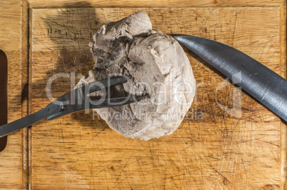 Cutting cooked meat