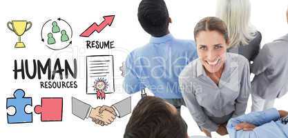 Composite image of businesswoman looking at camera with her coll