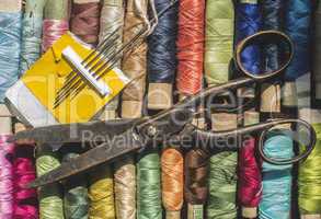 Sewing thread and scissors