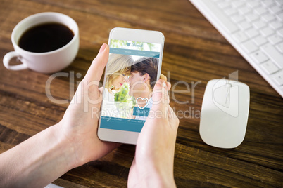 Composite image of woman using smartphone