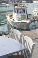 Typical greek restaurant and boat