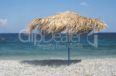 Straw umbrellas on the beach