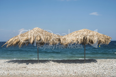 Straw umbrellas on the beach