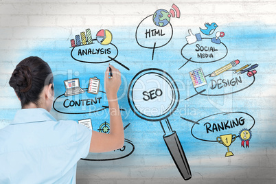 Composite image of concentrated businessman writing with marker Composite image of concentrated businessman writing with marker